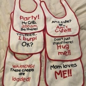 Set of 6 new bibs​​​​​​​​​​​​​